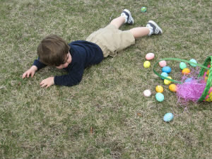 kid with easter eggs